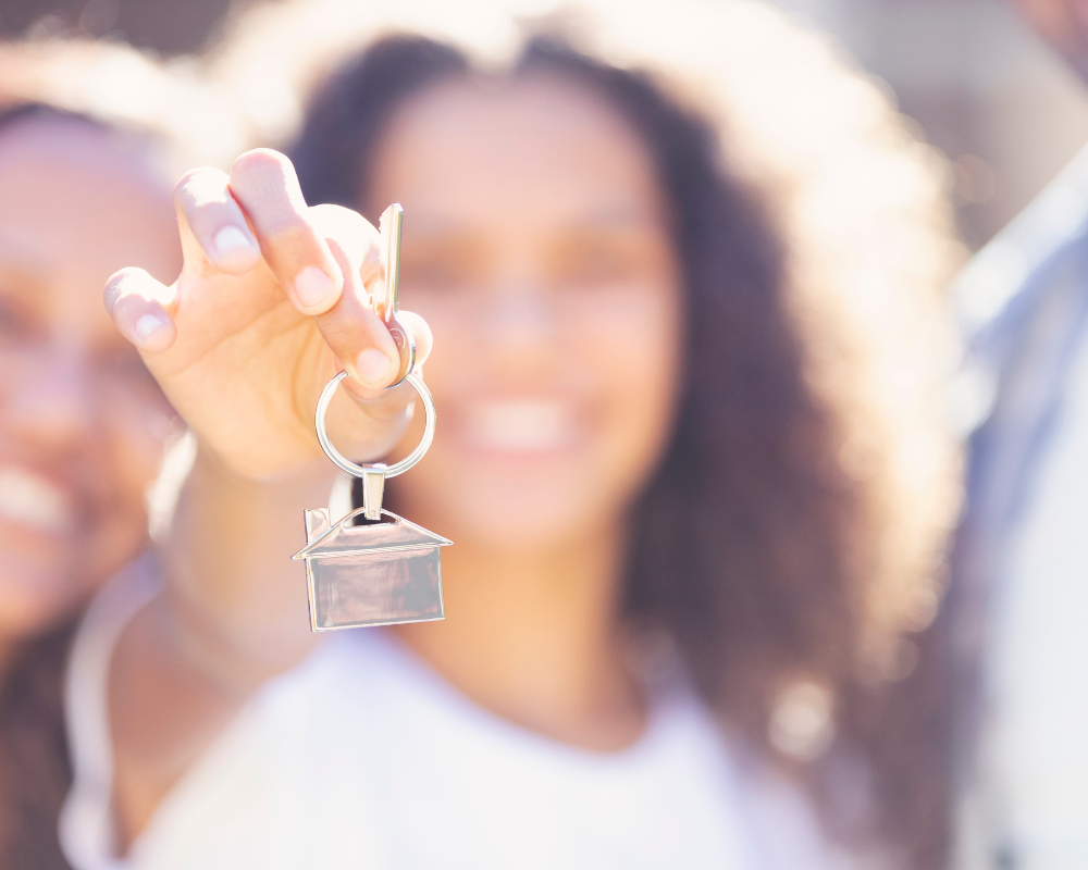 Women holding house keys